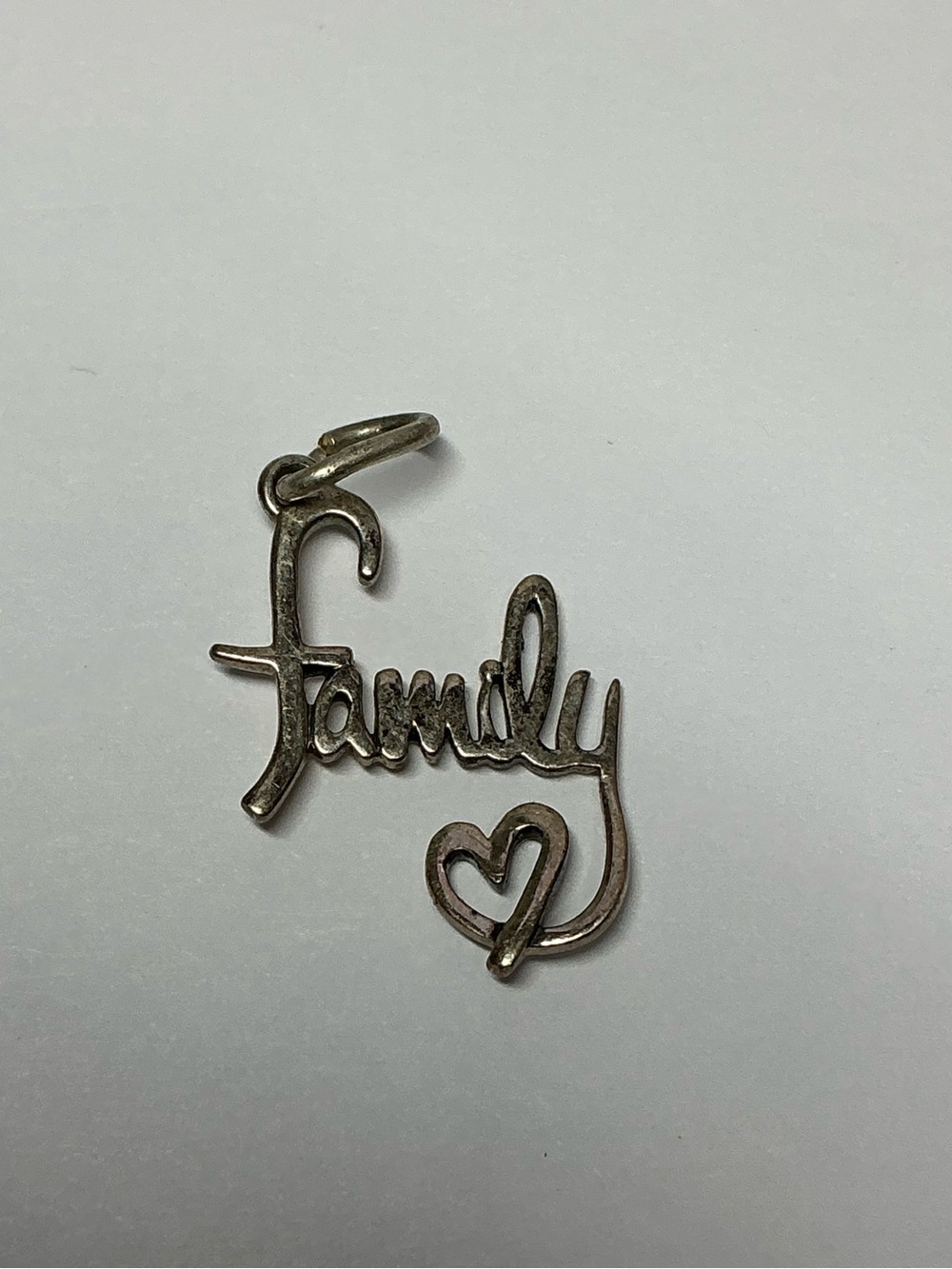 Sterling Silver family pendant.